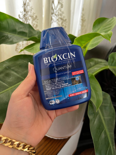 شامپو ضد ریزش بیوکسین مدل کوانتوم مناسب موهای نرمال تا خشک حجم 300 میل